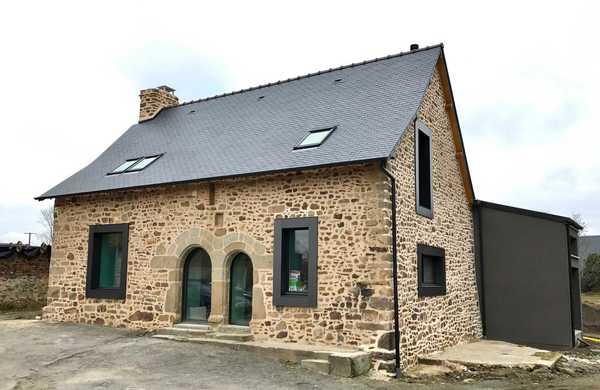 Extension d'une ancienne maison en pierre dans la région Sud